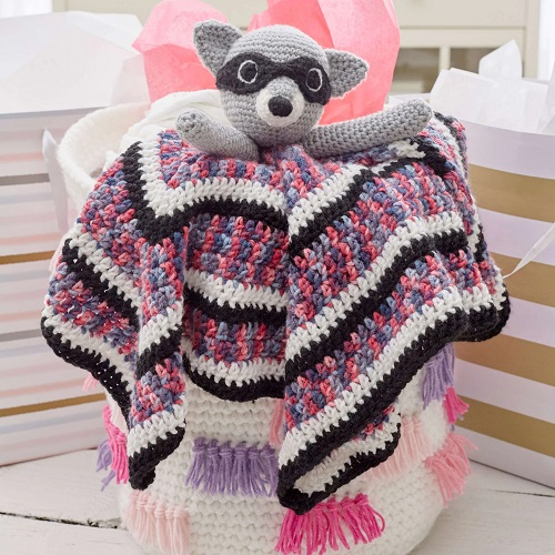 A playful raccoon lovey