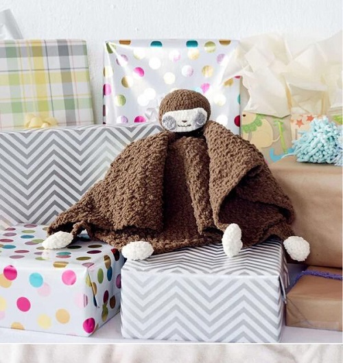 A relaxed sleepy sloth lovey